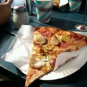 Photo taken at Camos Brothers Pizza by gabrina j. on 10/24/2011
