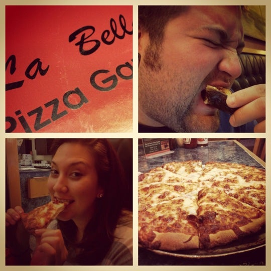 Photo taken at La Bella Pizza by Angie H. on 3/27/2012