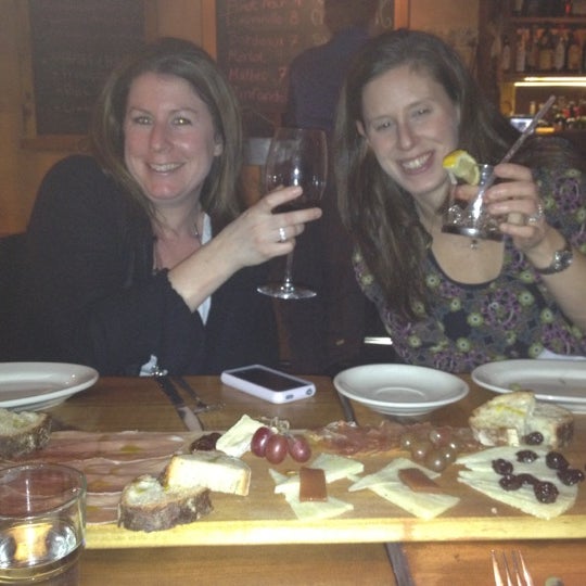 Photo taken at Salumi Tapas and Wine Bar by Nicole N. on 12/9/2011