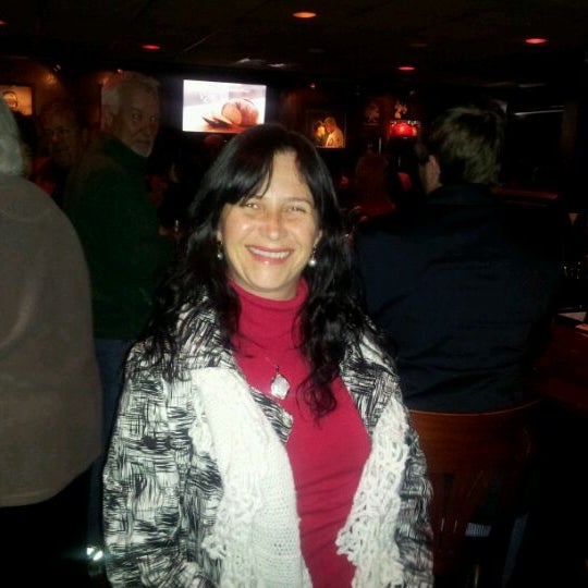 Photo taken at Ivarone&#39;s Steakhouse &amp; Italian Grill by Luis F. on 1/16/2012