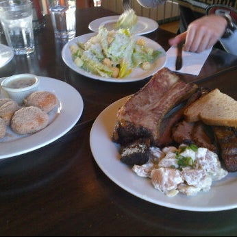 Photo taken at T-Rex Barbecue by Melissa C. on 1/14/2012