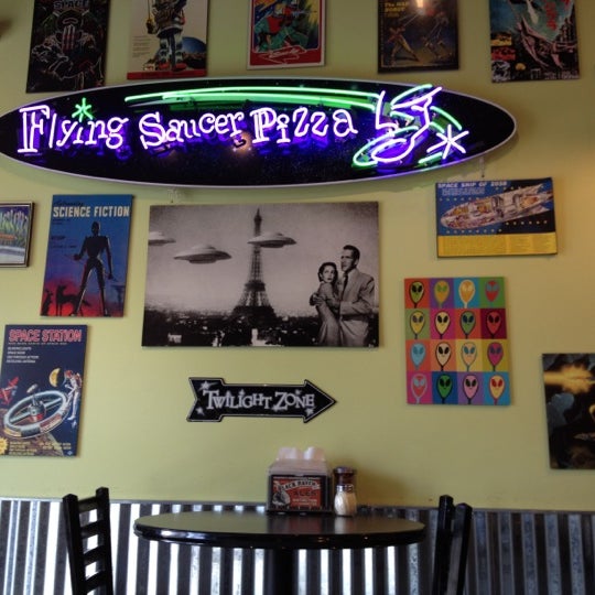 Photo taken at Flying Saucer Pizza by Tanya M. on 4/16/2012