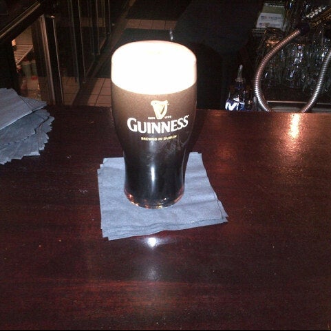 Photo taken at Katie Mullen&#39;s Irish Pub by Tom O. on 8/1/2012