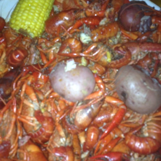 Photo taken at Crawfish Town USA by Annie V. on 3/27/2012