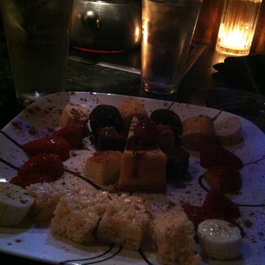 Photo taken at The Melting Pot by Taylor G. on 7/1/2012