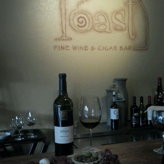 Photo taken at TOAST Wine and Cafe by Darin C. on 9/19/2011