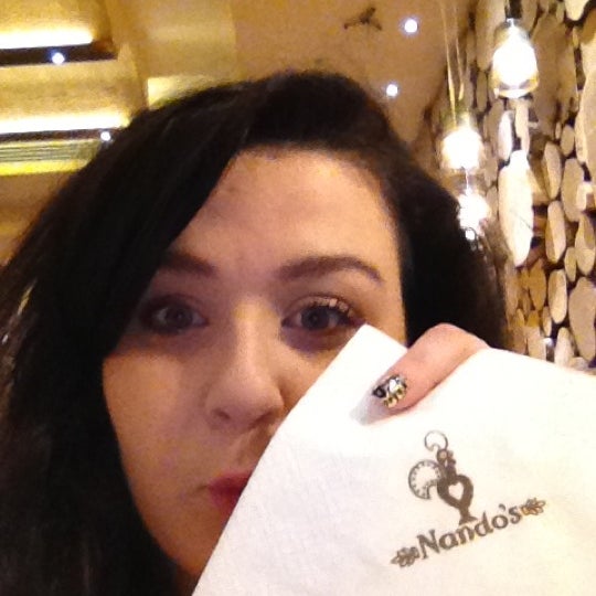 Photo taken at Nando&#39;s by Danielle M. on 3/4/2012