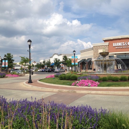 Photo taken at The Promenade Shops at Saucon Valley by Divina &amp; Eddy R. on 7/27/2012