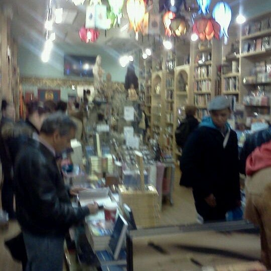 Photo taken at Namaste Bookshop by David R. on 12/22/2011