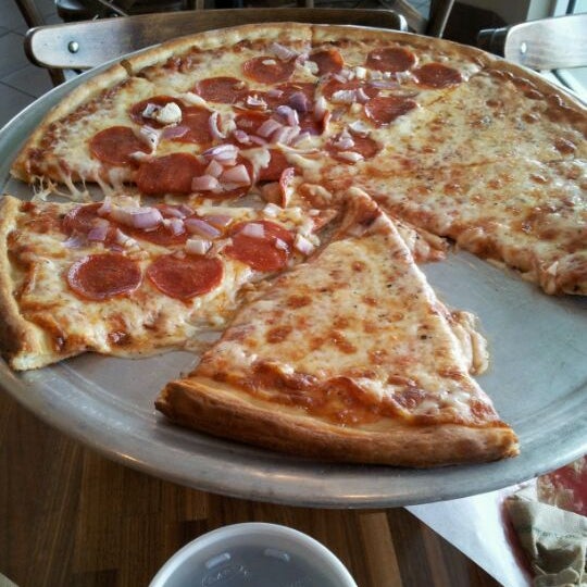 Photo taken at Cipriano&#39;s Pizzeria &amp; Restaurant by JJ V. on 4/18/2012