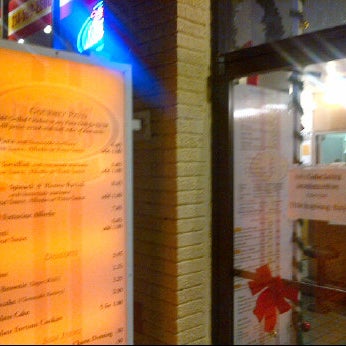 Photo taken at Zini&#39;s Pizzeria by Sean R. on 11/24/2011