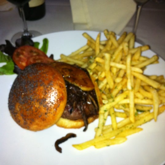 Photo taken at Josie Restaurant by Stephanie C. on 8/11/2011