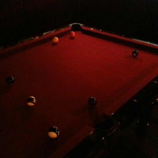 There is another bar upstairs with a billiard table.