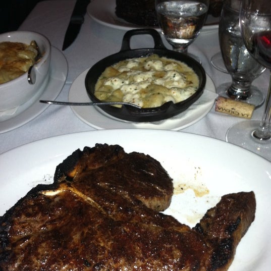 Photo taken at Dino &amp; Harrys Steakhouse by Michael W. on 9/22/2011