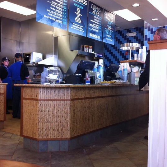 Photo taken at Elevation Burger by Laura H. on 1/31/2011