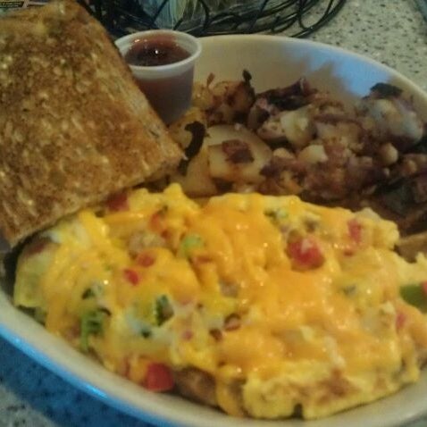 Photo taken at The Omelette Shoppe by Dave C. on 4/4/2012