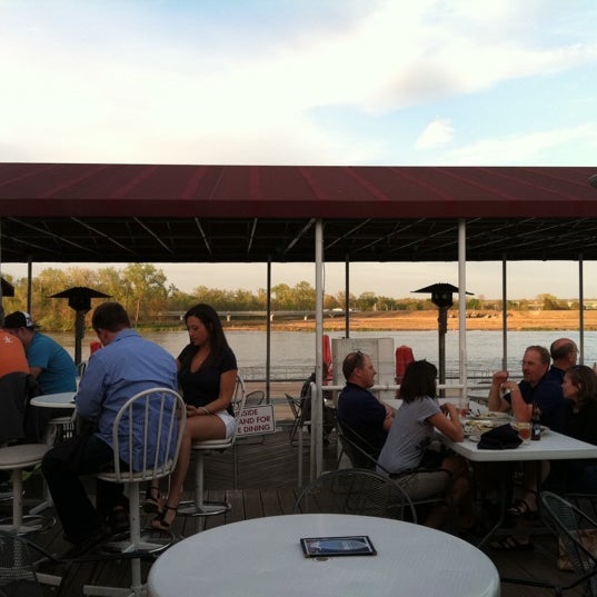 Photo taken at Rick&#39;s Cafe Boatyard by William K. on 5/8/2011