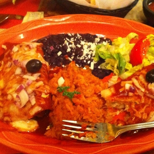 Photo taken at El Rincon Restaurant Mexicano by Tina B. on 3/13/2012