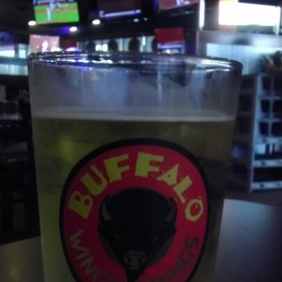 Photo taken at Wings &amp; Rings by Chris A. on 5/21/2012
