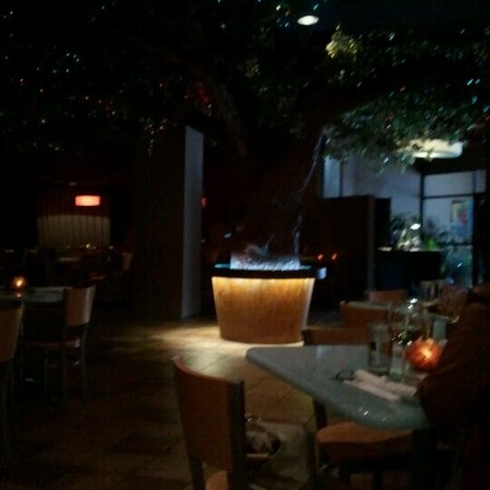 Photo taken at Koko Sushi Bar &amp; Lounge by Christine Z. on 4/30/2012
