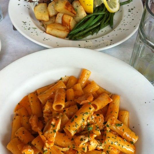 Photo taken at Trattoria D.O.C. by Sarah C. on 7/1/2012