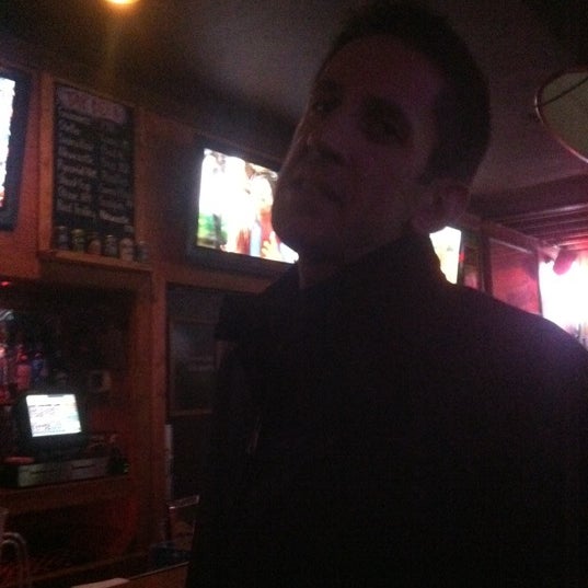Photo taken at 1st Street Bar by Sean Z. on 3/21/2012