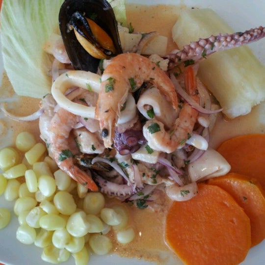 Photo taken at Restaurante Peruano Mis Tradiciones by MIS TRADICIONES M. on 7/22/2012