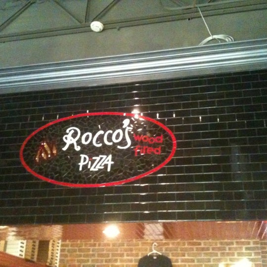 Photo taken at Rocco&#39;s Wood Fired Pizza by Christopher S. on 8/24/2012