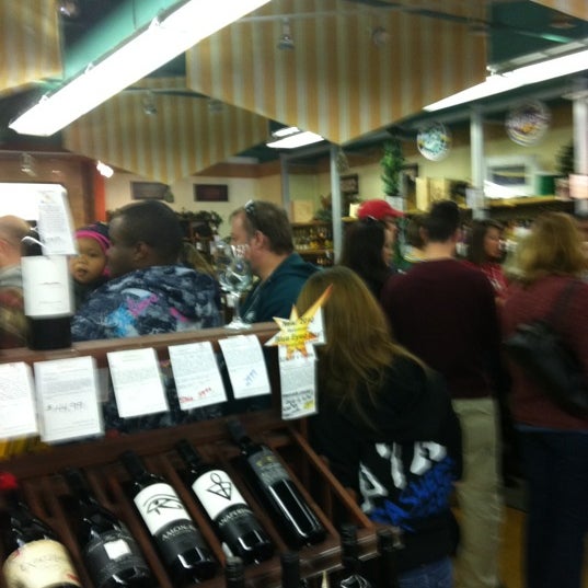 Photo taken at Grape &amp; Gourmet by Kelly M. on 1/14/2012