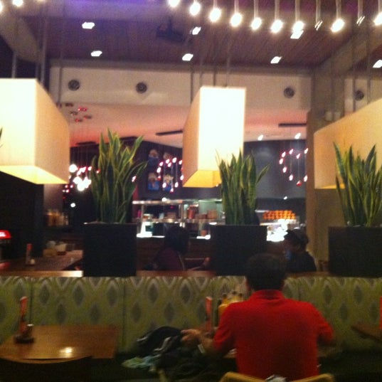 Photo taken at Nando&#39;s by Kevin G. on 4/23/2012