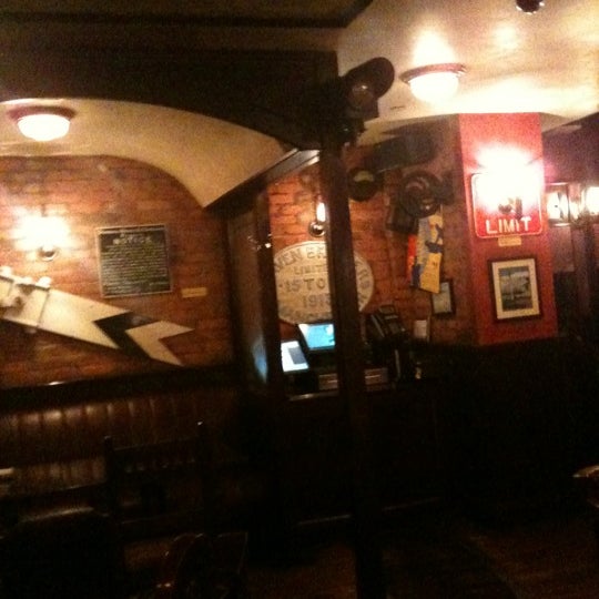 Photo taken at The Wheeltapper Pub by Li D. on 1/3/2012