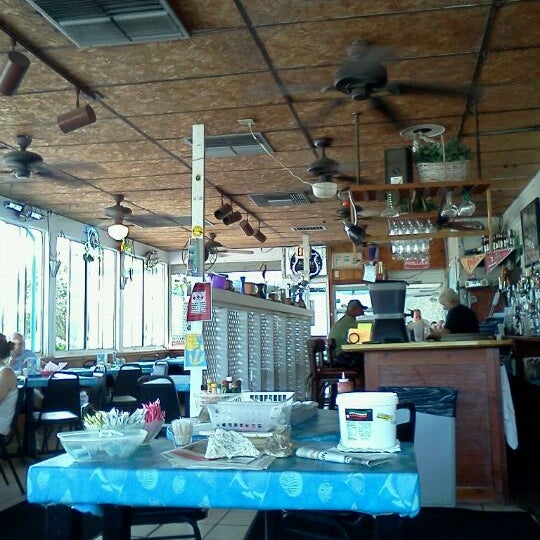 Photo taken at Cracked Conch Cafe by Bobbie B. on 11/30/2011