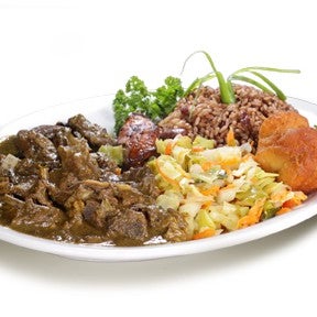 Foto scattata a Ackee Bamboo Jamaican Cuisine da Ackee B. il 3/21/2012