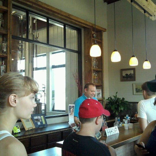 Photo taken at Mississippi River Distilling Company &amp; Cody Road Cocktail House by Juliana B. on 6/30/2012