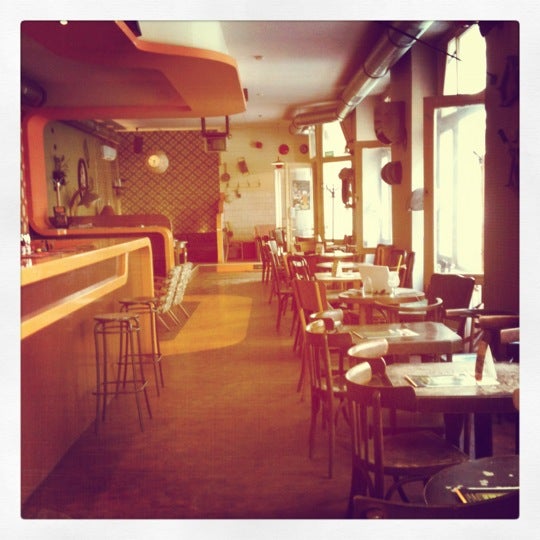 Photo taken at Garzon Café by Robert V. on 6/4/2012
