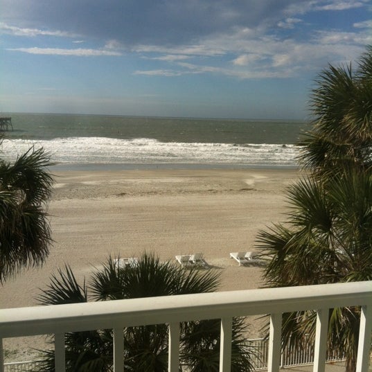 Photo taken at Tides Folly Beach by Shira T. on 4/26/2012