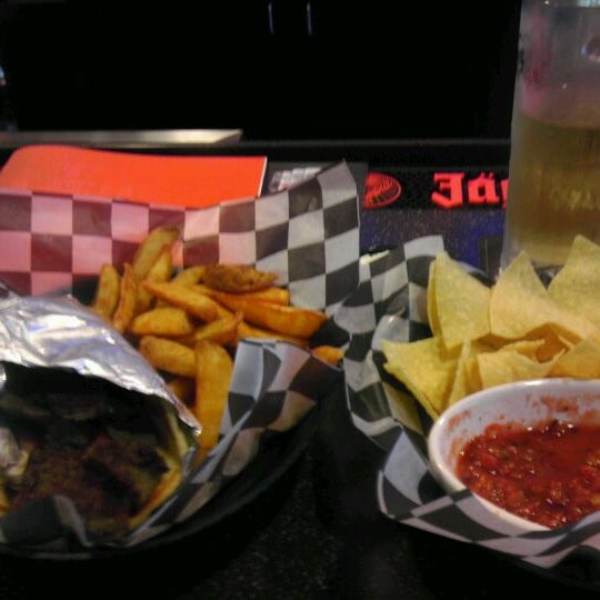 Photo taken at Wings &amp; Rings by ᴡ S. on 3/15/2012