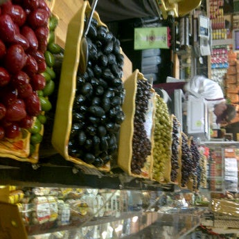Photo taken at Grace&#39;s Marketplace NYC by Craig T. on 12/3/2011