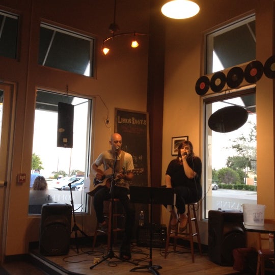 Photo taken at Roots Coffeehouse by Brandon P. on 6/3/2012