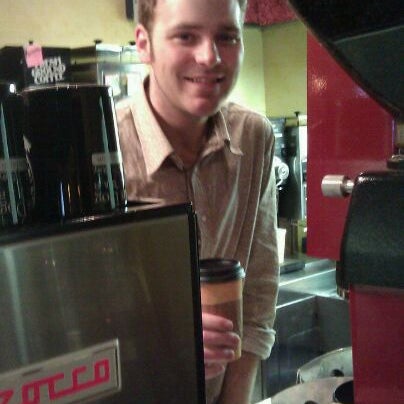 Photo taken at Nervous Dog Coffee Bar &amp; Roaster by Loretta S. on 11/29/2011