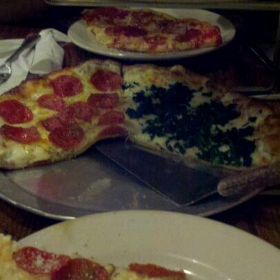 Photo taken at Angelo&#39;s Pizzeria &amp; Ristorante by Lauren M. on 1/31/2012