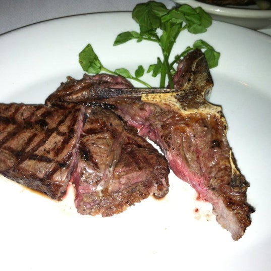 Photo taken at Shula&#39;s Steak House by Lisa D. on 5/10/2012