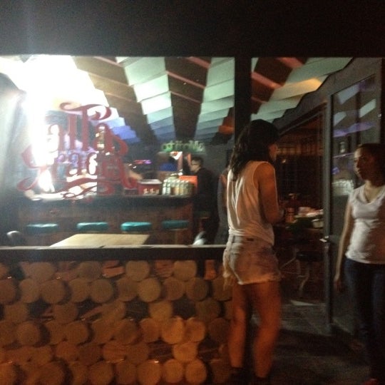 Photo taken at Altagracia es cafá, tragos and food by Laura Z. on 7/7/2012