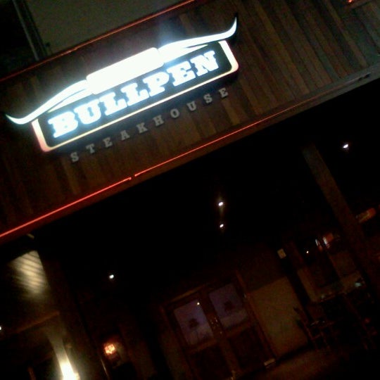 Photo taken at Jack&#39;s Bullpen Steakhouse by Livs C. on 7/12/2012