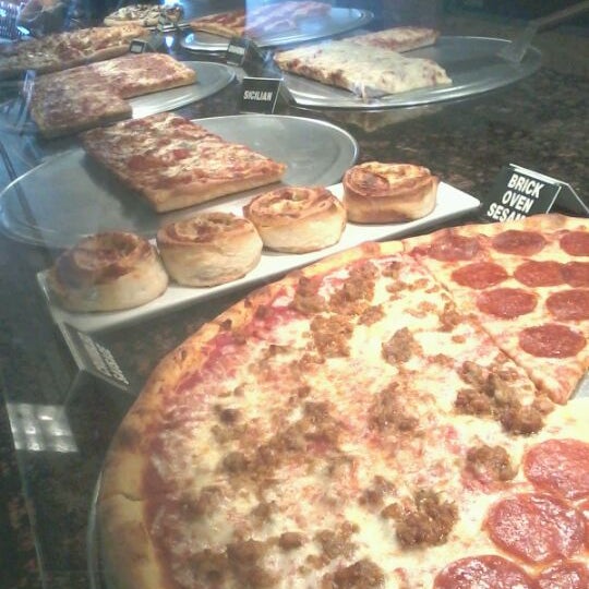 Photo taken at Richie&#39;s Pizza by Jonny M. on 3/21/2012