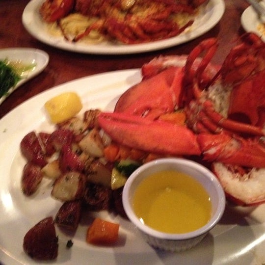 Photo taken at Blue Water Seafood by Kevin E. on 5/16/2012