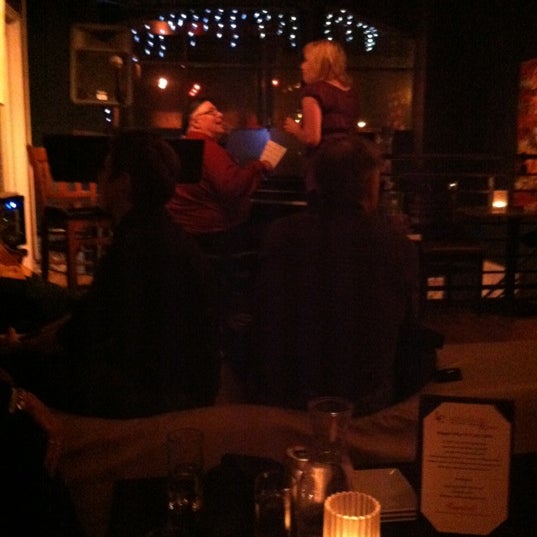 Photo taken at Left Coast Wine Bar by Lisa K. on 3/25/2012