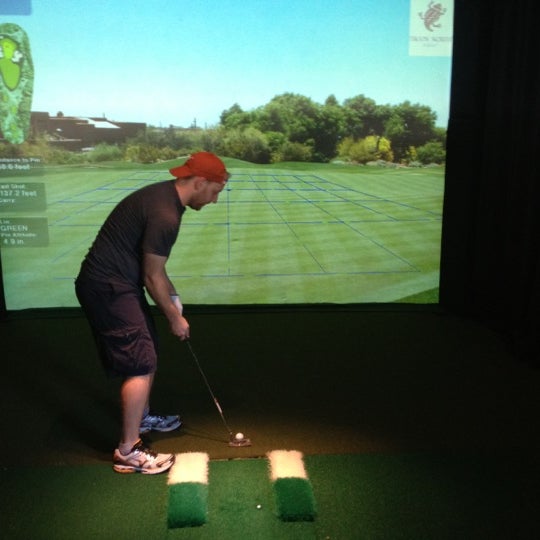 Photo taken at The Range Golf Center &amp; Sports Bar by Kevin K. on 9/3/2012
