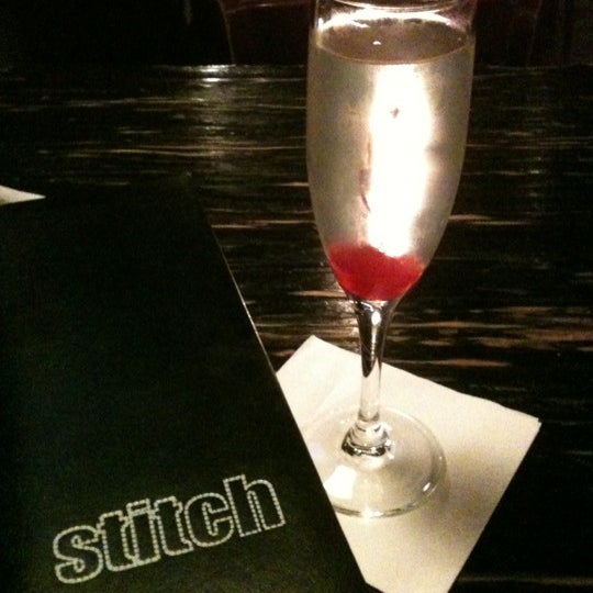 Photo taken at Stitch Bar &amp; Lounge by Kitty S. on 8/19/2012