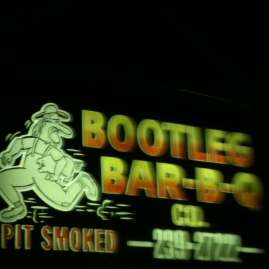 Photo taken at Bootleg Bar-B-Q by Olivia E. on 3/23/2012